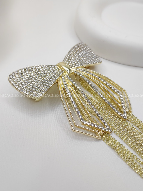 پاپی.ن فلزی طلایی